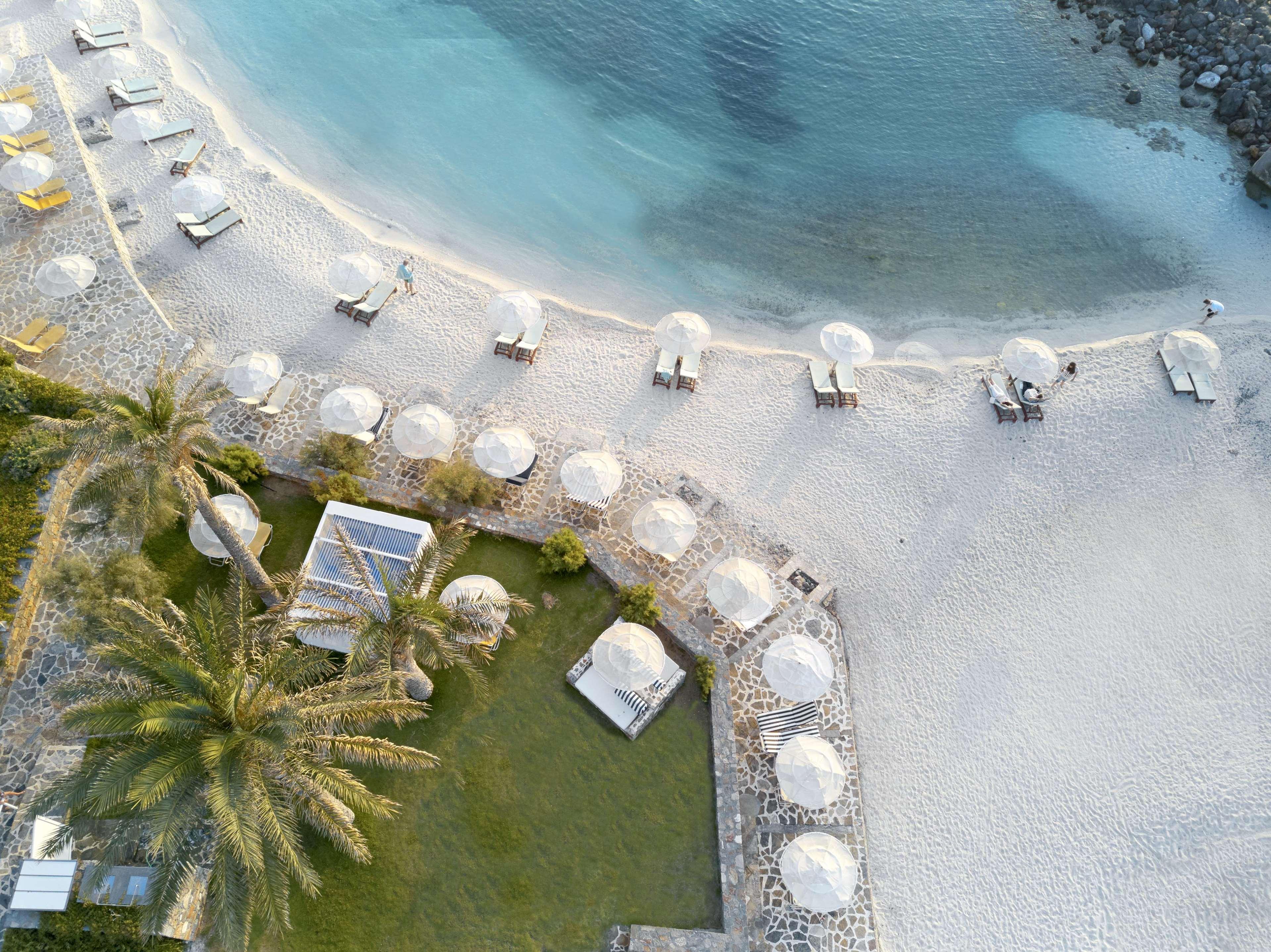 Minos Imperial Luxury Beach Resort & Spa Milatos Esterno foto Aerial view of the beach at the resort