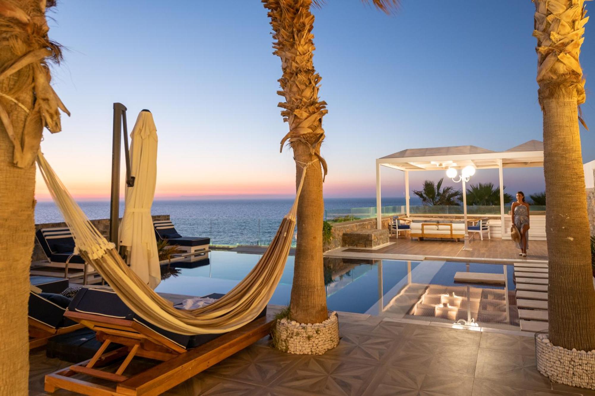 Minos Imperial Luxury Beach Resort & Spa Milatos Esterno foto The pool at the hotel