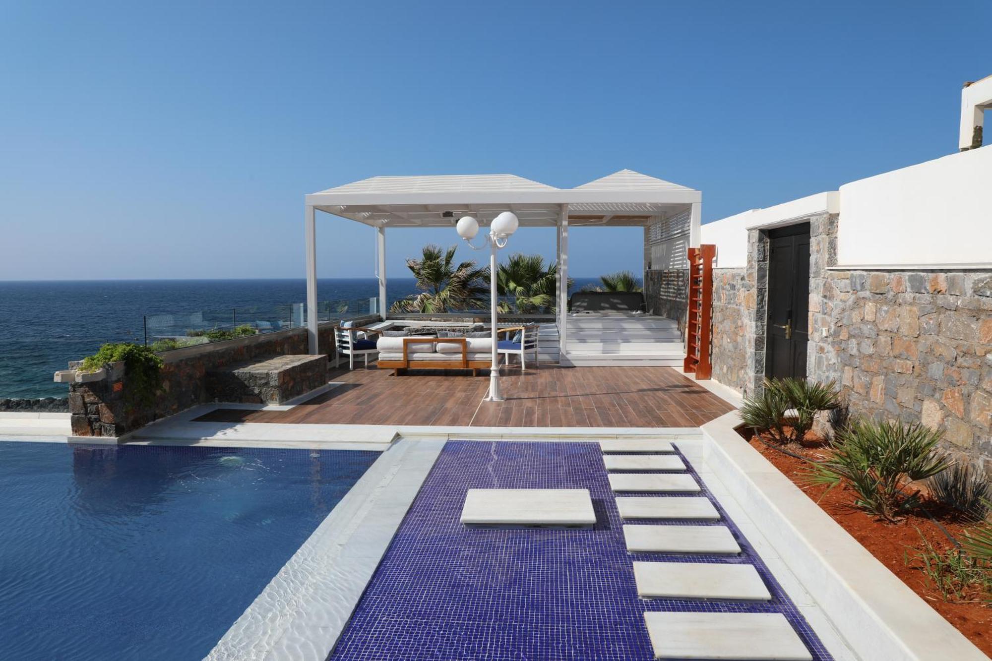 Minos Imperial Luxury Beach Resort & Spa Milatos Esterno foto The pool at the hotel